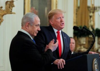 FILE PHOTO: U.S. President Donald Trump and Israel's Prime Minister Benjamin Netanyahu hold a joint news conference to discuss a new Middle East peace plan proposal in the East Room of the White House in Washington, U.S., January 28, 2020. REUTERS/Brendan McDermid/File Photo