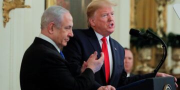 FILE PHOTO: U.S. President Donald Trump and Israel's Prime Minister Benjamin Netanyahu hold a joint news conference to discuss a new Middle East peace plan proposal in the East Room of the White House in Washington, U.S., January 28, 2020. REUTERS/Brendan McDermid/File Photo