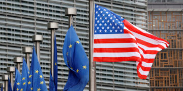 U.S. and European Union flags are pictured during the visit of Vice President Mike Pence to the European Commission headquarters in Brussels, Belgium February 20, 2017. REUTERS/Francois Lenoir